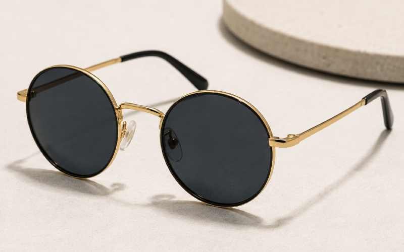 Close-up of round-frame sunglasses highlighting the classic Circle Sunglasses design.